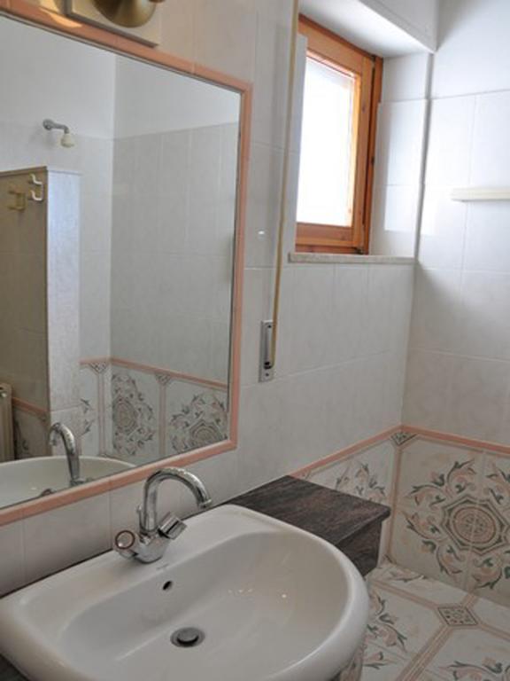 Hotel L'Oasi Cala Gonone Pokoj fotografie